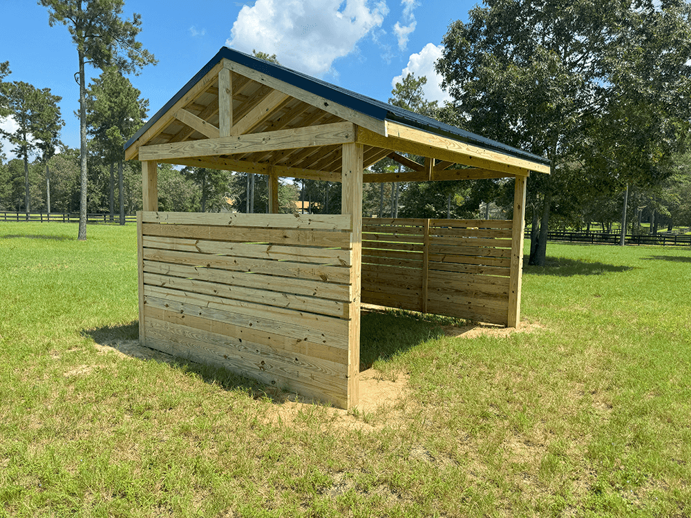 Horses using a run-in shelter